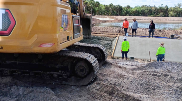 Rain in the Forecast? How to Protect Your Concrete Pour (and When to Reschedule)